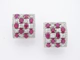 une paire de boucles d'oreilles en rubis et diamants