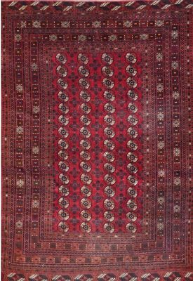 a red and black rug with a pattern on it