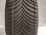 a close up of a tire on a white surface