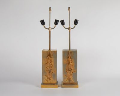 pair of art deco candlesticks in the manner of person