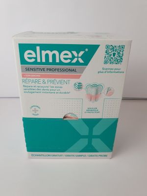 an empty box of a pair of ear buds sitting on a table