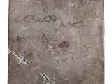a piece of concrete with graffiti on it
