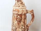 a beer mug that is sitting on a table
