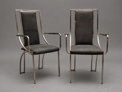 paire de fauteuils en chrome et cuir