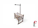 a small crib with a bed and a lamp on it
