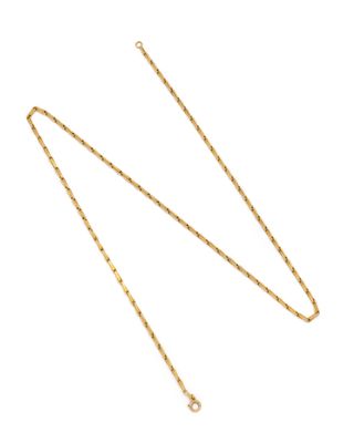un collier en or auquel est attachée une chaîne