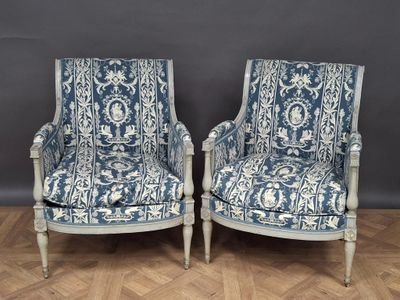 pair of blue and white upholstered chairs in the style of louis ii