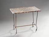 une image représentant une table avec un plateau en marbre et des pieds en fer