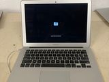 a laptop computer that is sitting on a table