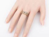 an image of a woman ' s hand with a ring on it ' s finger