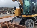 a picture of a construction vehicle parked on the side of the road