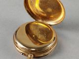 gold plated pocket watch with key and chain