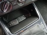 an image of a car dashboard with a remote control