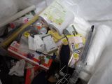 a pile of items in a plastic bag on the floor