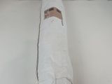 a roll of toilet paper on a white surface