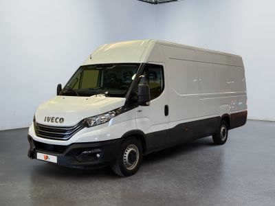 a white van that is parked in a room