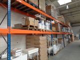 many boxes and boxes on the shelves in the warehouse
