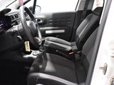 a car that has a steering wheel and a dashboard