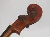 an image of a violin that is sitting on top of a table