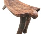 a small wooden bench with two legs on a white background