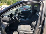 the interior of a car with the driver ' s seat up