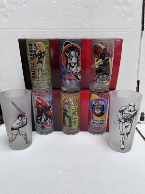 a lot of star wars drinking glasses on the table