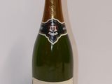a bottle of champagne that is sitting on a table