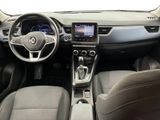 a picture of the interior of a car with a steering wheel and dashboard