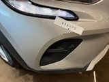 a close up of a car with a sticker on it ' s bumper