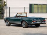 an image of a green convertible car parked in front of a building