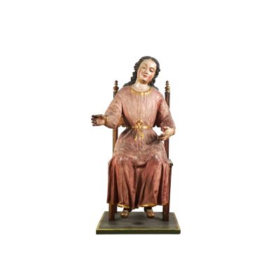 statue of a woman sitting on a chair with a basket of flowers in her lap