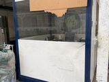 an image of a store front with a broken window
