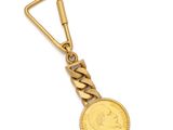 a close up of a key chain with a coin on it
