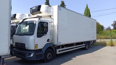 a white truck that is parked on the side of the road