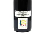 a bottle of wine that is sitting on a table
