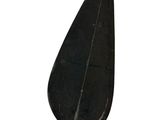 a large black knife with a wooden handle on a white background