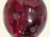 an image of a red glass ball on a white background