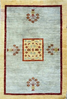 a beige and red rug with a square design on it