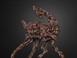 a bronze sculpture of a deer on a black background