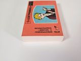 a small book with a picture of a woman on it