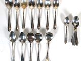 a lot of spoons and spoon spoons on the table