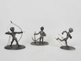 three metal figurines of a man with a bow and arrow