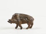 figurine of a wild boar on a white background