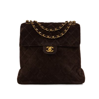 a chanel brown sued shoulder bag with gold hardware