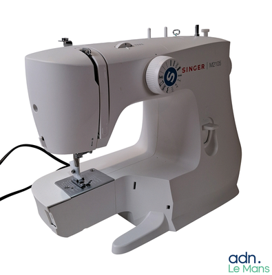 an image of a sewing machine on a white background