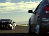 two cars that are driving down the road together