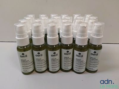 a close up of a bunch of bottles of liquid on a table
