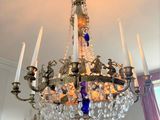 a chandelier that is hanging from the ceiling