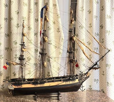 a small model of a ship on a table