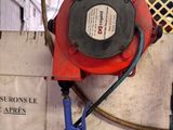 a picture of a fire hydrant with a hose attached to it